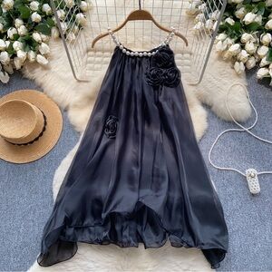 Elegant Black Satin Dress with Pearl Detail